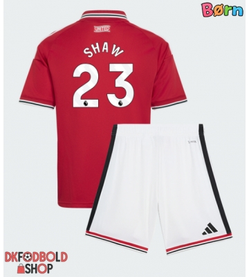 Manchester United Luke Shaw #23 Hjemmebanesæt Børn 2026-27 Kort ærmer (+ korte bukser)